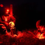 Soldiers in the field at night