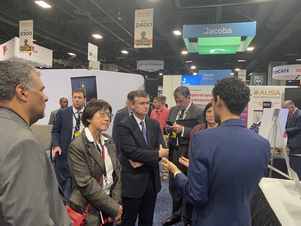 Hon. Heidi Shyu, Under Secretary of Defense for Research and Engineering (left), and Hon. Douglas Bush, Assistant Secretary of the Army for Acquisition, Logistics and Technology (right), speak with Dr. Austin Murdock, CEO of SixMap, Inc., an xTechSearch 6 winner, at the xTech Innovator’s Corner during the 2022 Association of the United States Annual Meeting and Exposition in Washington, D.C. (U.S. Army)